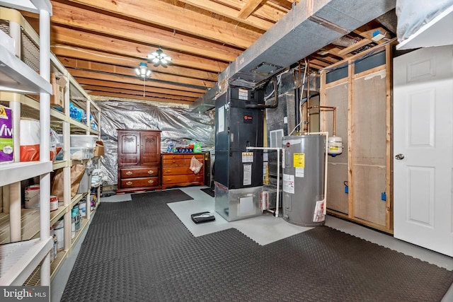 unfinished basement with electric water heater and heating unit