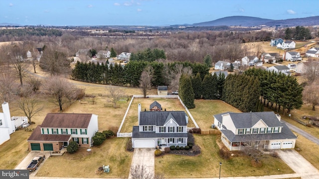 bird's eye view with a residential view and a mountain view