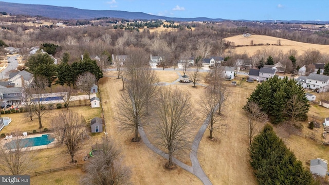 drone / aerial view with a residential view and a mountain view