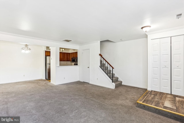 unfurnished living room with carpet