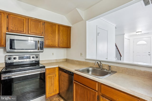 kitchen with sink and appliances with stainless steel finishes