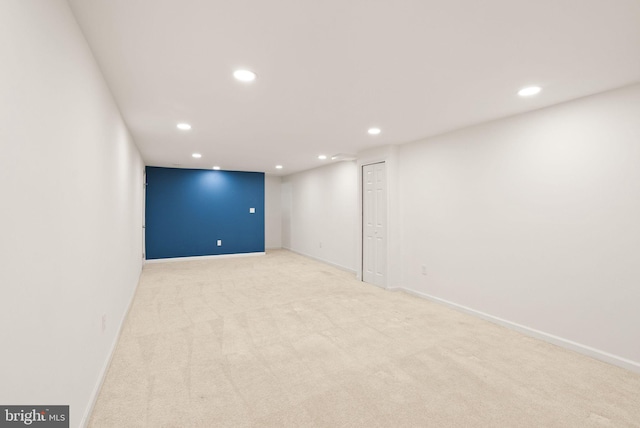 finished below grade area with recessed lighting, baseboards, and carpet