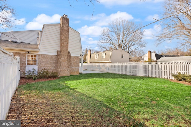 view of yard featuring a fenced backyard