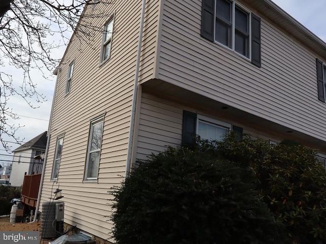 view of property exterior with cooling unit