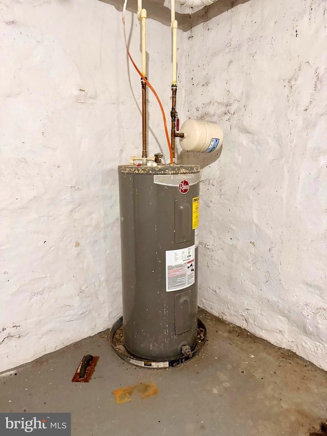 utility room with water heater