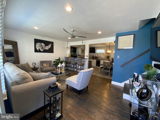 living area featuring recessed lighting, dark wood-style flooring, and ceiling fan