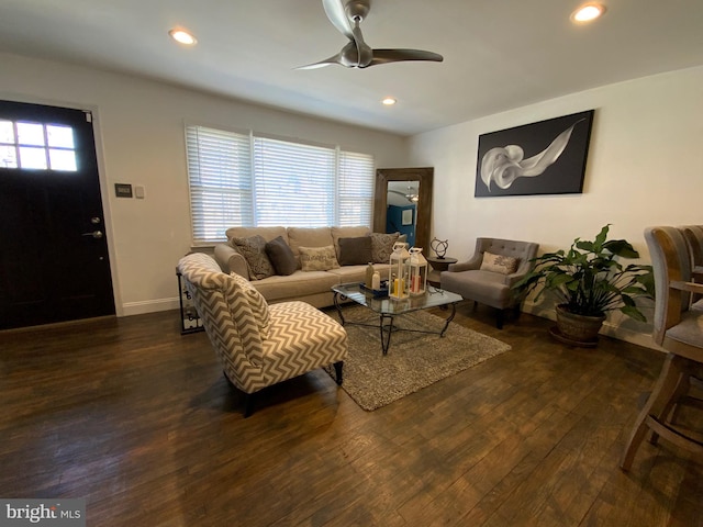 living room with baseboards, a ceiling fan, dark wood-style flooring, and recessed lighting