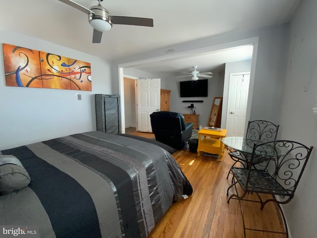 bedroom featuring ceiling fan and wood finished floors