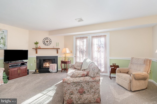 living room featuring carpet