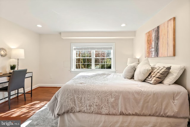 bedroom featuring dark wood-type flooring