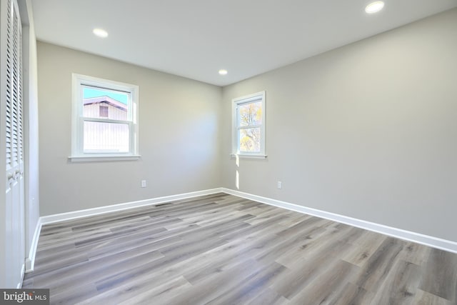 unfurnished bedroom with light hardwood / wood-style flooring