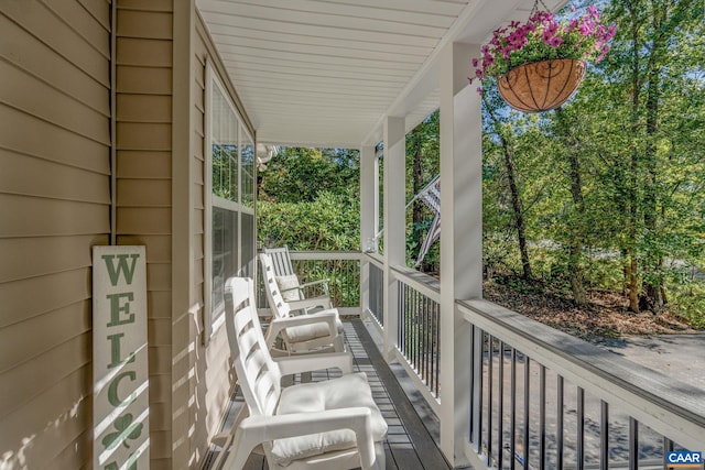 balcony featuring covered porch