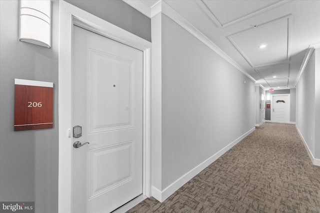 corridor featuring carpet floors, ornamental molding, recessed lighting, and baseboards