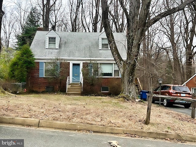 view of new england style home