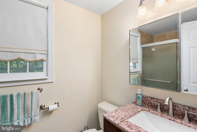 6510 Oakwood Dr, Falls Church, VA 22041 - bathroom featuring toilet, vanity, and a stall shower