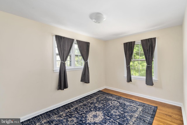 6510 Oakwood Dr, Falls Church, VA 22041 - empty room featuring wood finished floors and baseboards