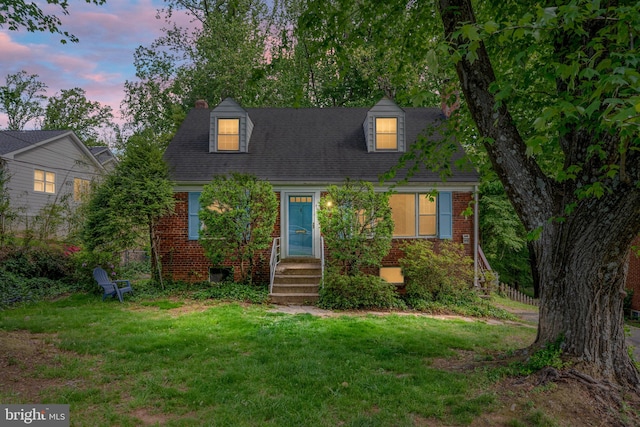 6510 Oakwood Dr, Falls Church, VA 22041 - cape cod home with brick siding and a front yard