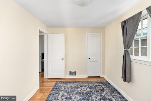 6510 Oakwood Dr, Falls Church, VA 22041 - interior space featuring light wood-style flooring, baseboards, and visible vents