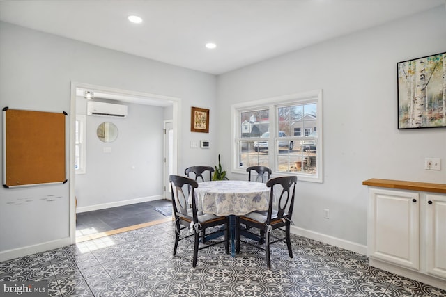 tiled dining room with an AC wall unit