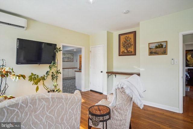 interior space featuring dark wood-type flooring and a wall unit AC