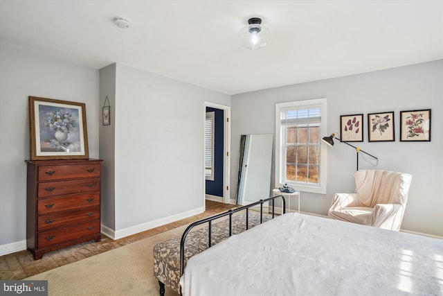 bedroom with light hardwood / wood-style flooring