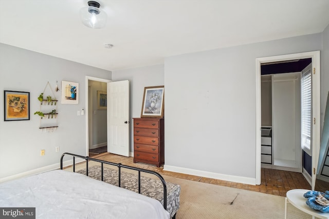 bedroom with wood-type flooring