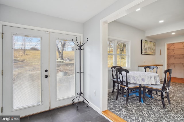 dining area with french doors and a healthy amount of sunlight