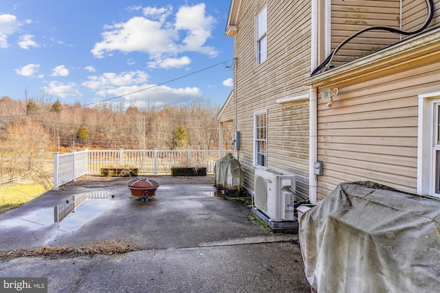 view of patio / terrace with an outdoor fire pit