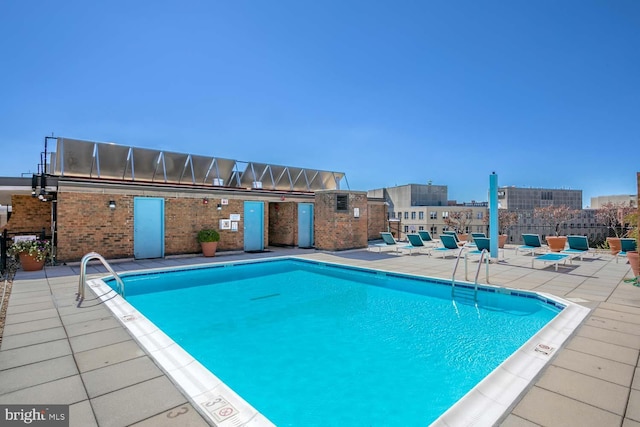 community pool featuring a patio