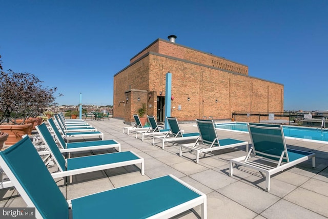 view of patio / terrace with a community pool