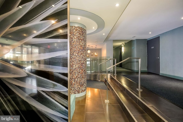 interior space featuring baseboards and recessed lighting