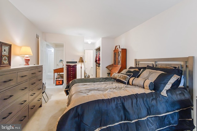 bedroom with carpet flooring and visible vents