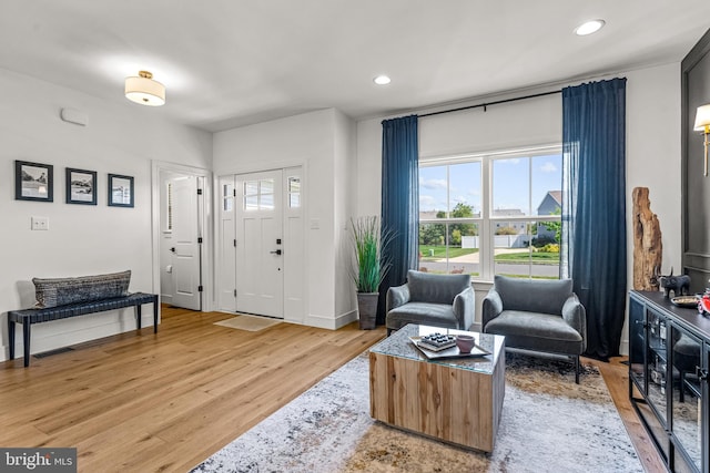 entryway with light hardwood / wood-style flooring