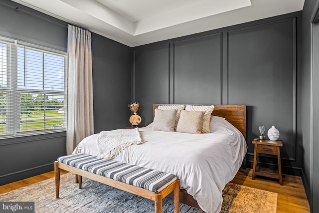 bedroom with light hardwood / wood-style flooring