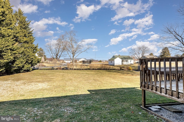 view of yard with a deck