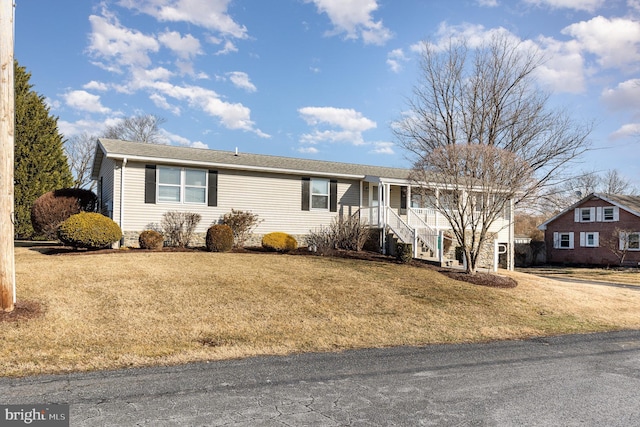 single story home with a front yard