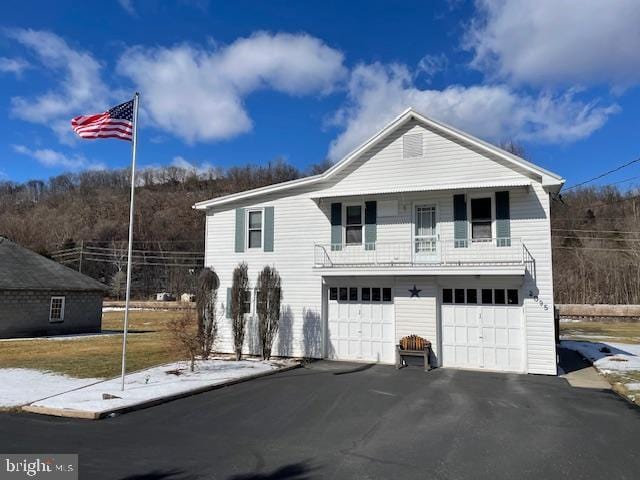 view of front of property with a garage