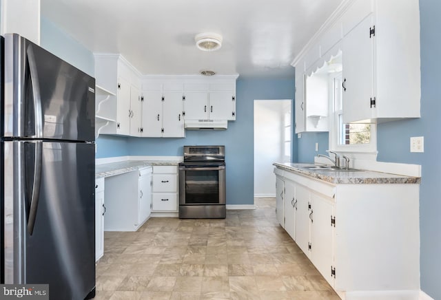 kitchen featuring sink, stainless steel appliances, and white cabinets