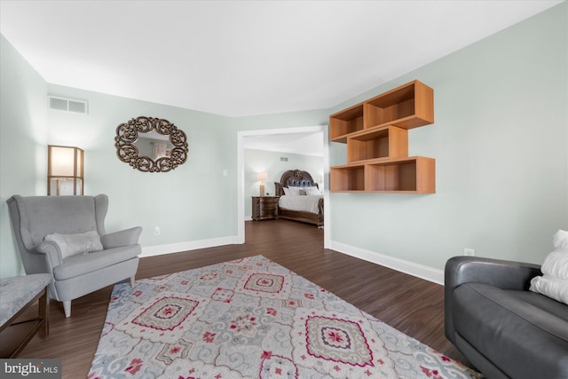 living area with dark wood-type flooring