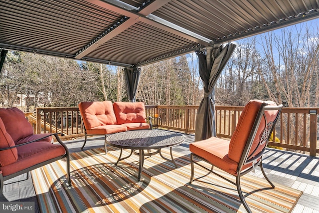 deck with an outdoor hangout area