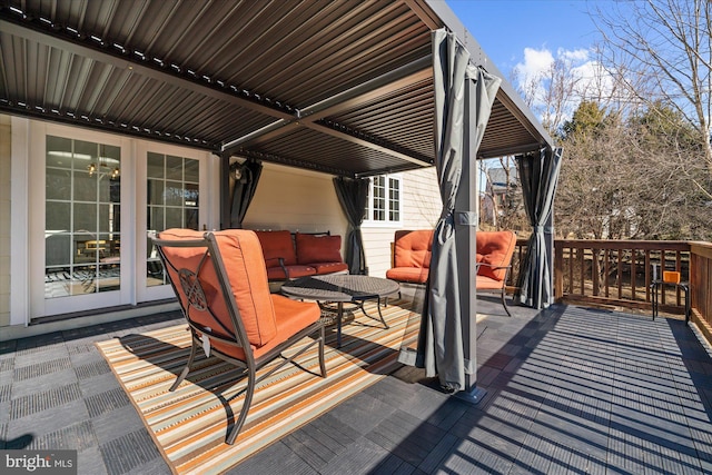 wooden deck featuring an outdoor hangout area