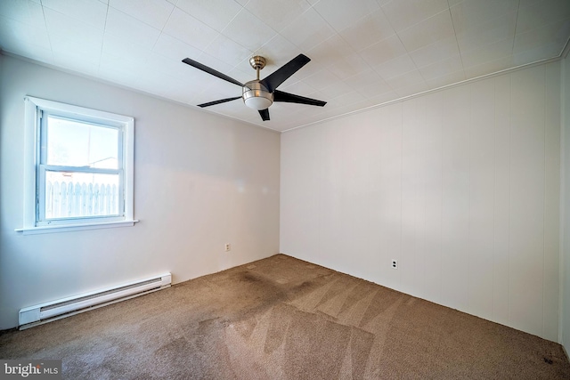 carpeted spare room featuring baseboard heating and ceiling fan