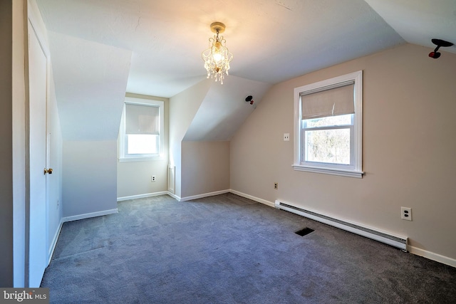 bonus room featuring a baseboard radiator, baseboards, carpet, and lofted ceiling