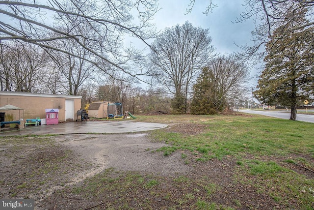 view of yard with a playground