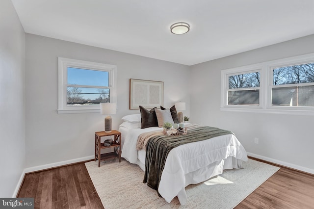 bedroom featuring hardwood / wood-style flooring