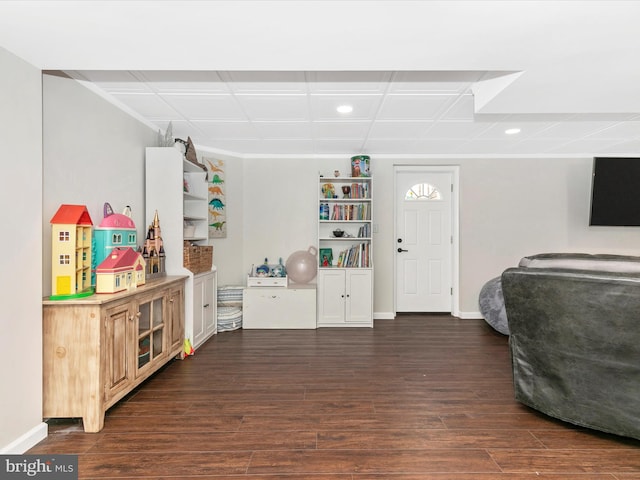 interior space with baseboards and dark wood finished floors