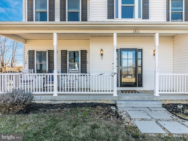 entrance to property with a porch