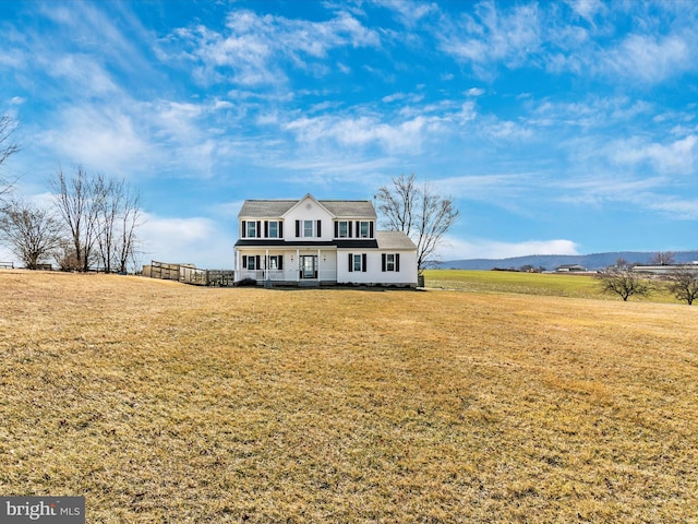 view of front of home with a front lawn