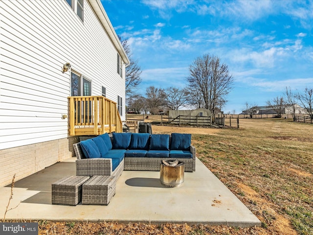 view of patio / terrace with fence and an outdoor hangout area