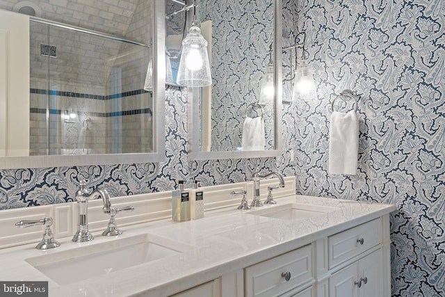 1556 Widows Mite Rd, Edgewater, MD 21037 - bathroom with wallpapered walls, double vanity, and a stall shower